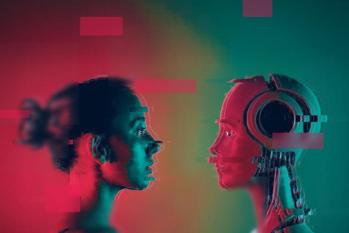 woman face-to-face with AI humanoid
